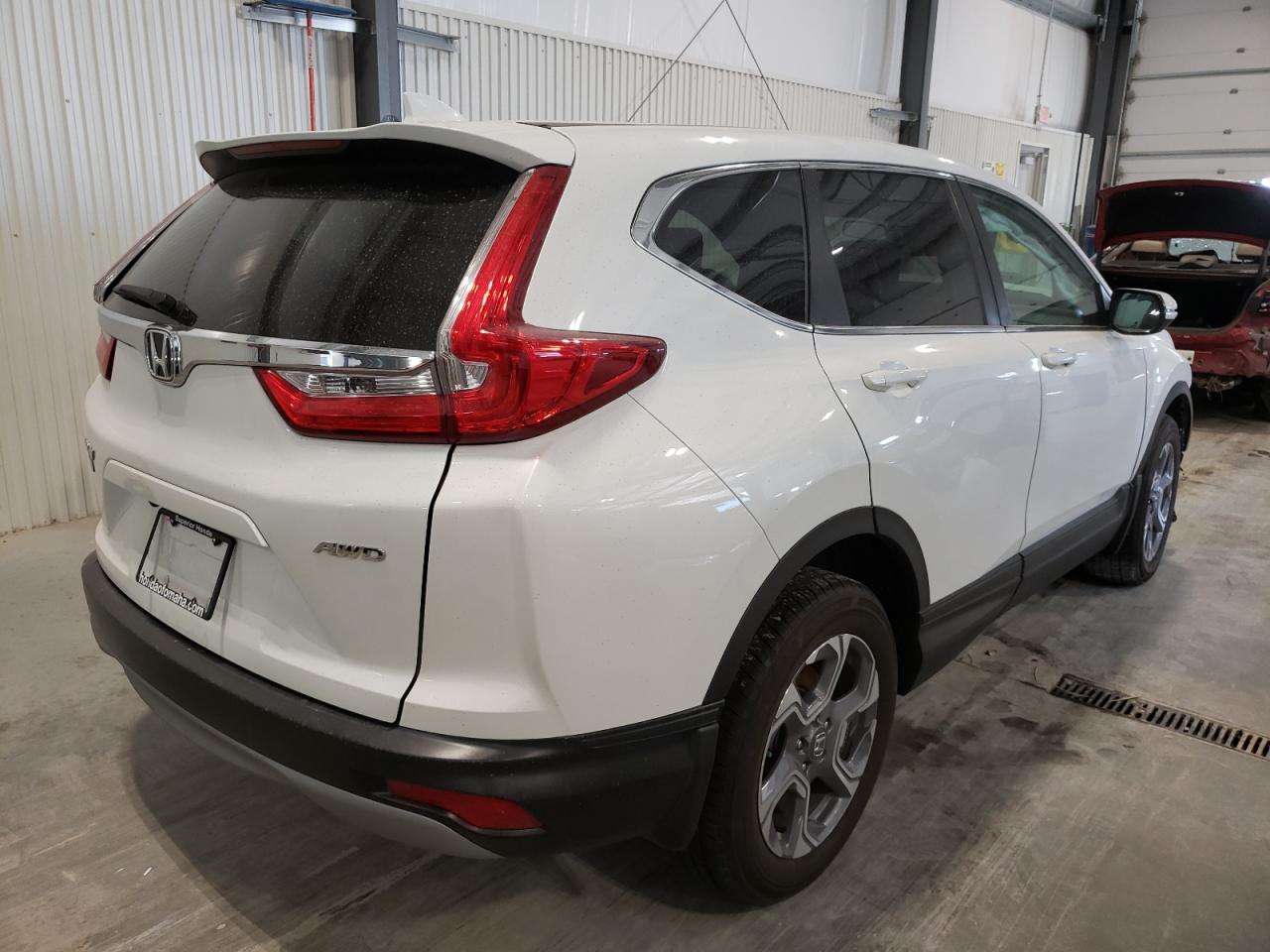 Photo 4 from auction – 2019 HONDA CR-V EX with VIN 7FARW2H56KE059287