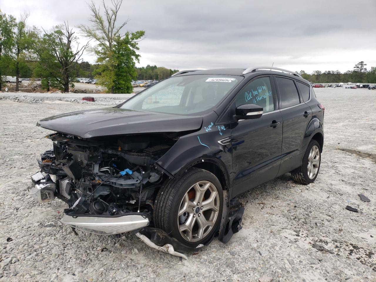 Photo 2 from auction – 2019 FORD ESCAPE TIT with VIN 1FMCU0J99KUA38686