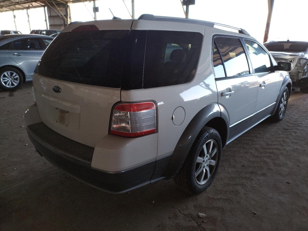 Photo 4 from auction – 2008 FORD TAURUS X S with VIN 1FMDK02W48GA10347