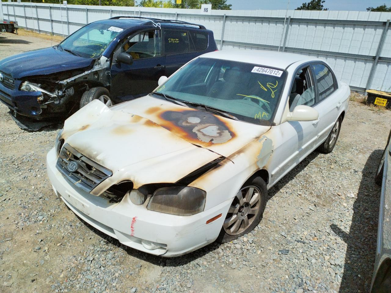 Photo 2 from auction – 2004 KIA OPTIMA LX with VIN KNAGD128545261593