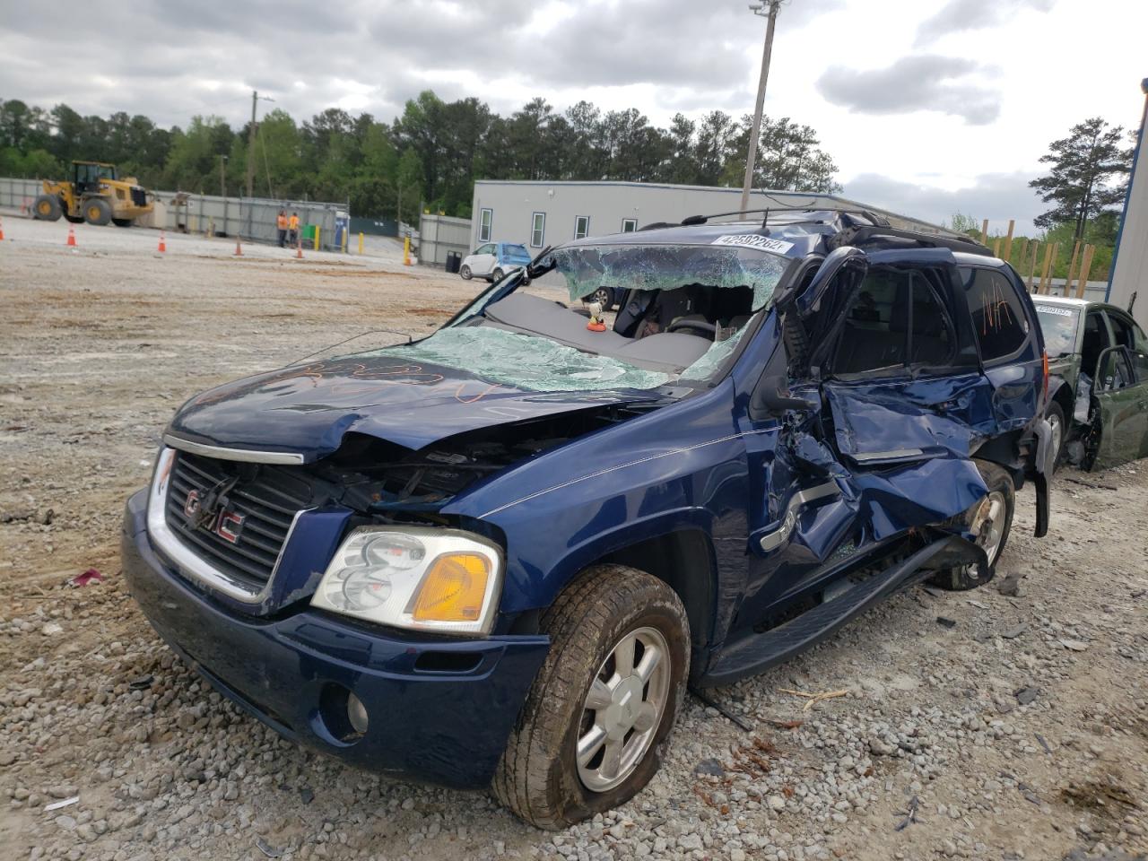Photo 2 from auction – 2004 GMC ENVOY with VIN 1GKDS13S142210541