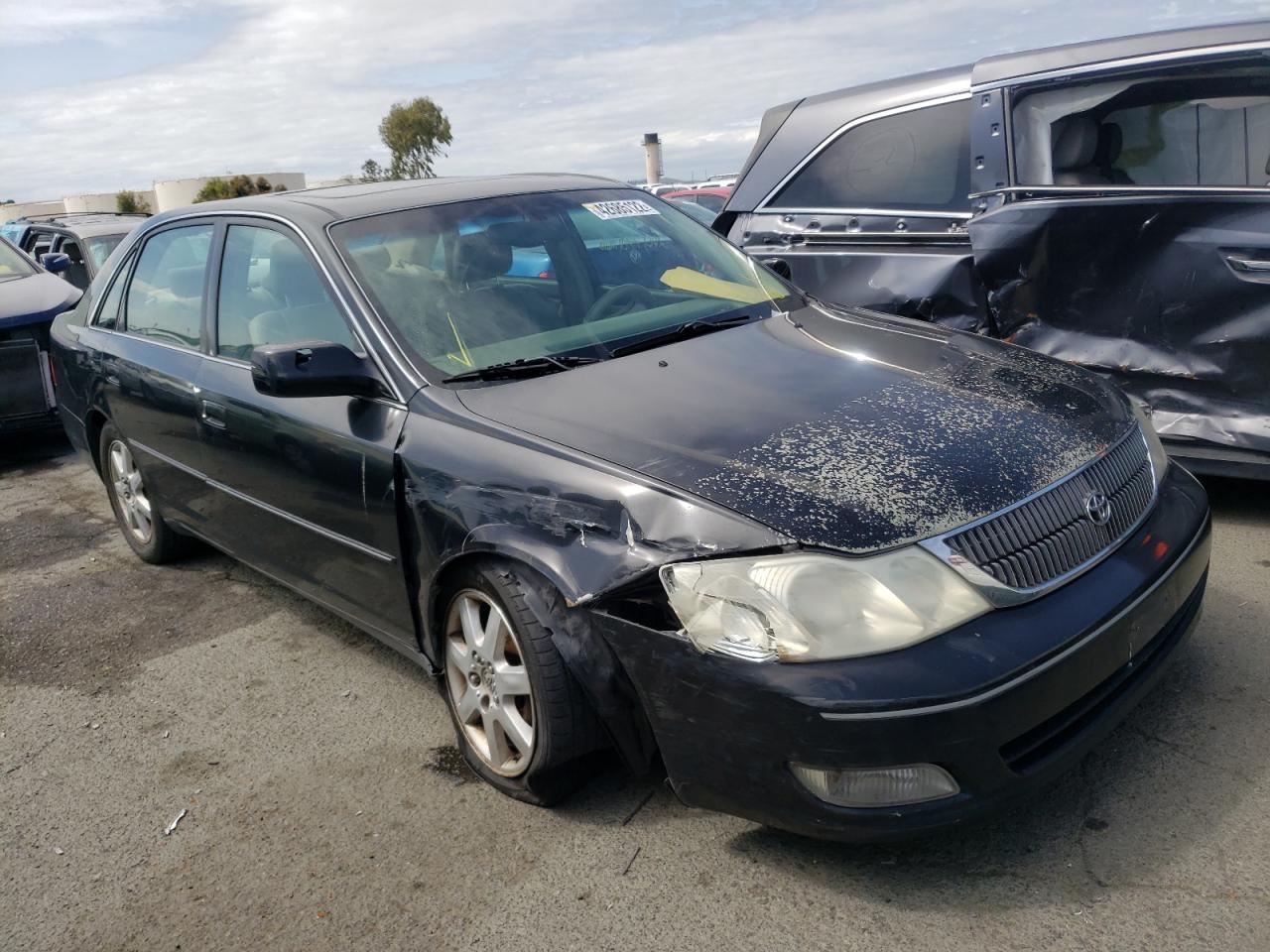 TOYOTA AVALON XL 2000 with VIN 4T1BF28B7YU049754 - Photo from auction