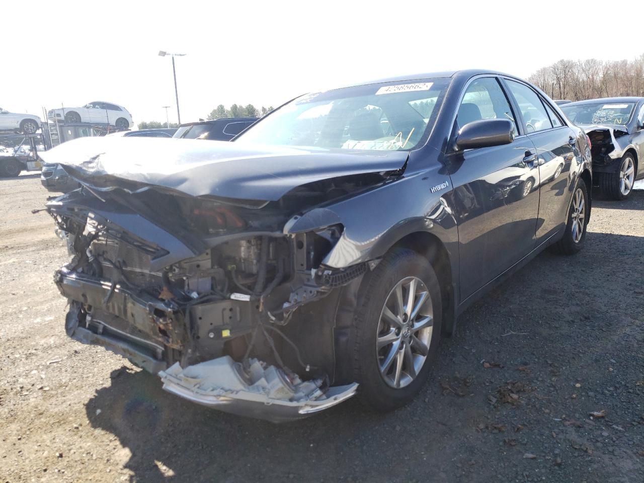 Photo 2 from auction – 2011 TOYOTA CAMRY HYBR with VIN 4T1BB3EK7BU137698