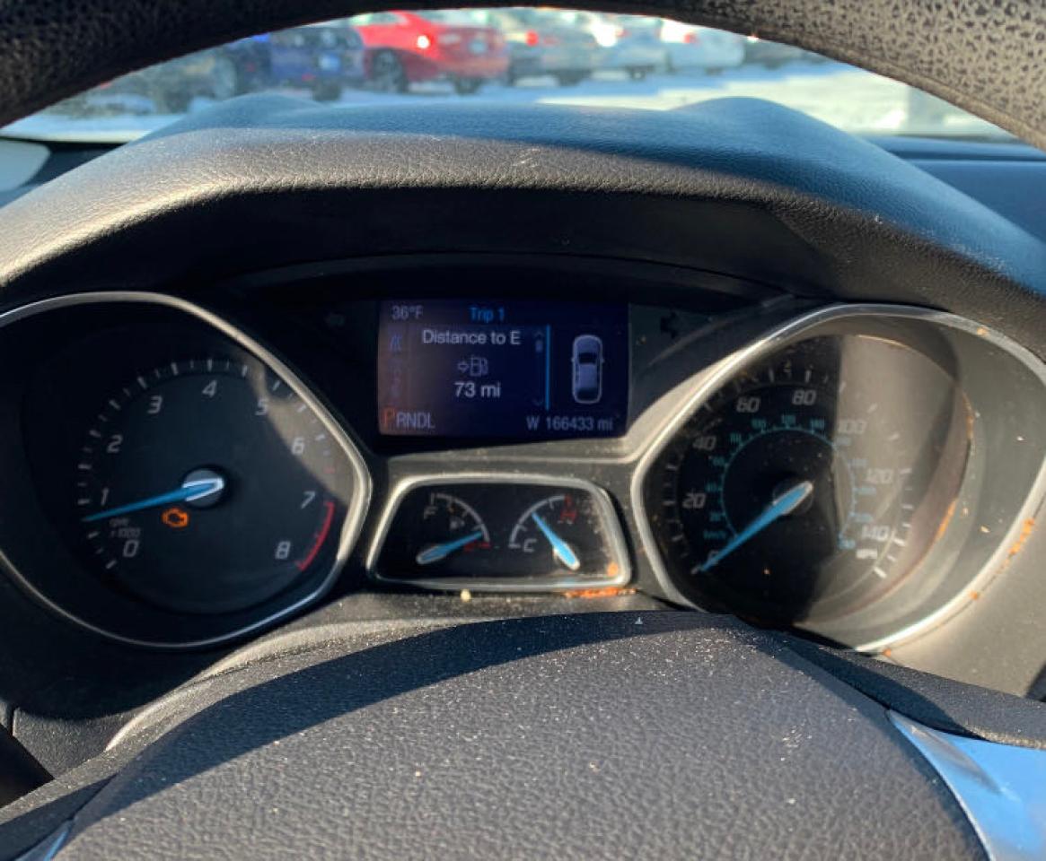 Photo 8 from auction – 2014 FORD FOCUS SE with VIN 1FADP3K28EL209771
