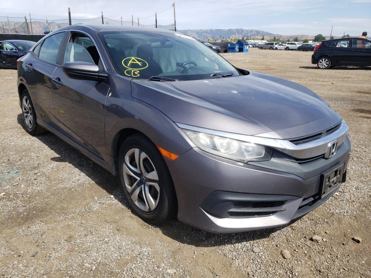 HONDA CIVIC LX 2016 with VIN 19XFC2F57GE215280 - Photo from auction