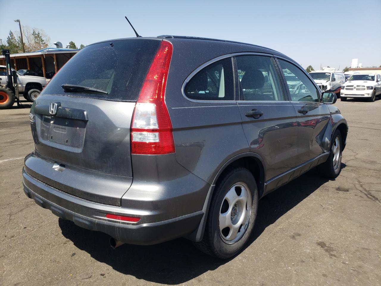 Photo 4 from auction – 2011 HONDA CR-V LX with VIN 5J6RE3H33BL010087