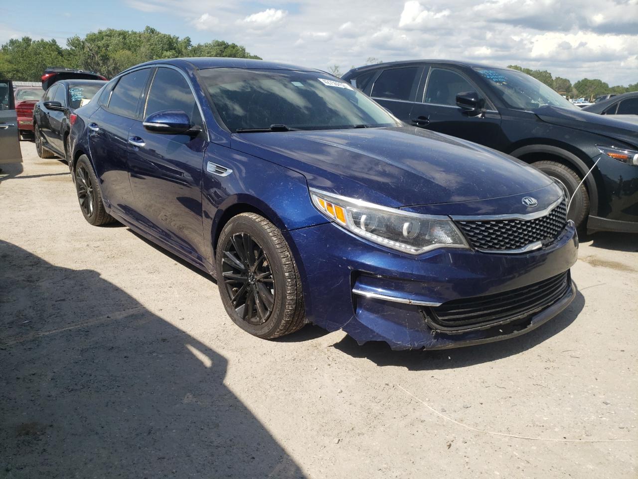 KIA OPTIMA EX 2016 with VIN 5XXGU4L39GG003634 - Photo from auction