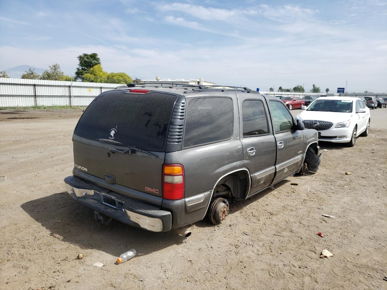 Photo 4 from auction – 2001 GMC YUKON with VIN 1GKEK13T61J181875