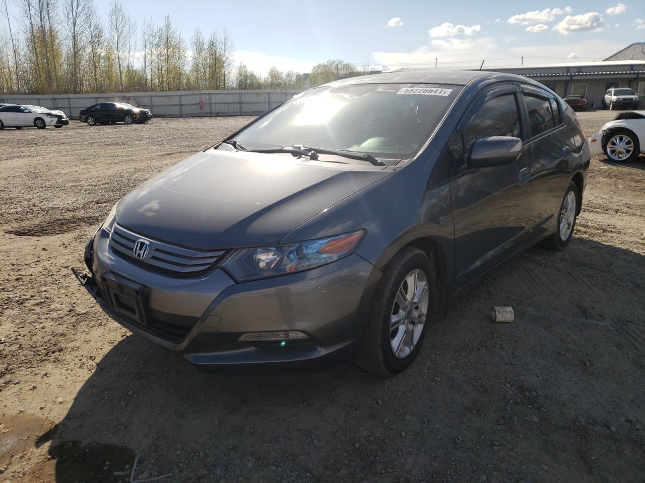 Photo 2 from auction – 2010 HONDA INSIGHT EX with VIN JHMZE2H75AS040097