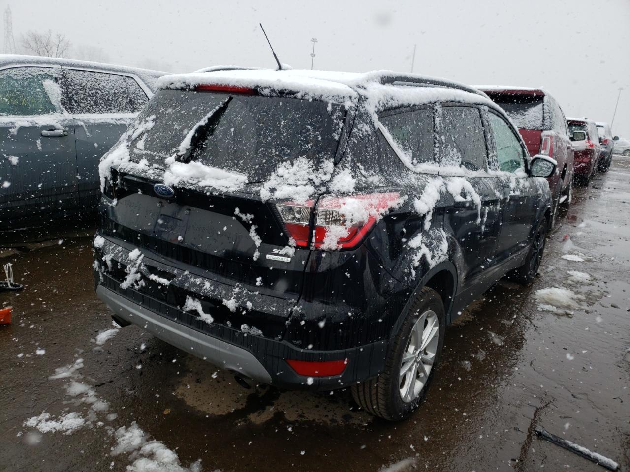 Photo 4 from auction – 2017 FORD ESCAPE SE with VIN 1FMCU0GD7HUE91628