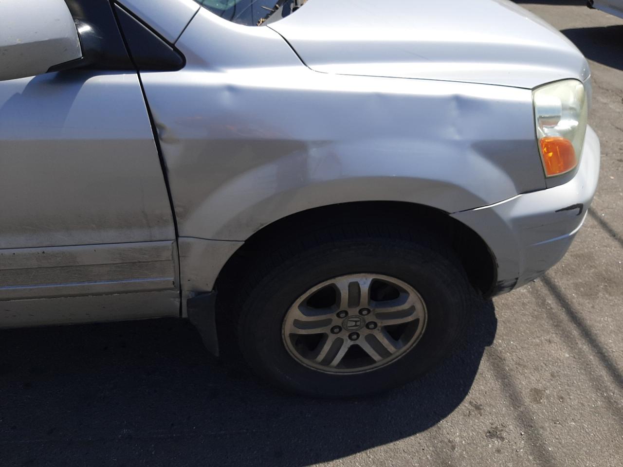 Photo 9 from auction – 2004 HONDA PILOT EXL with VIN 2HKYF18644H607110