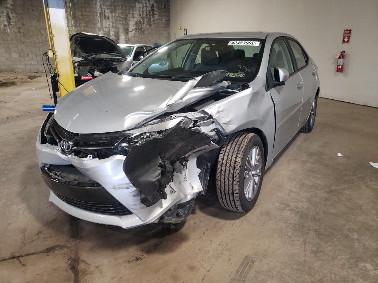Photo 2 from auction – 2015 TOYOTA COROLLA L with VIN 2T1BURHE4FC308644