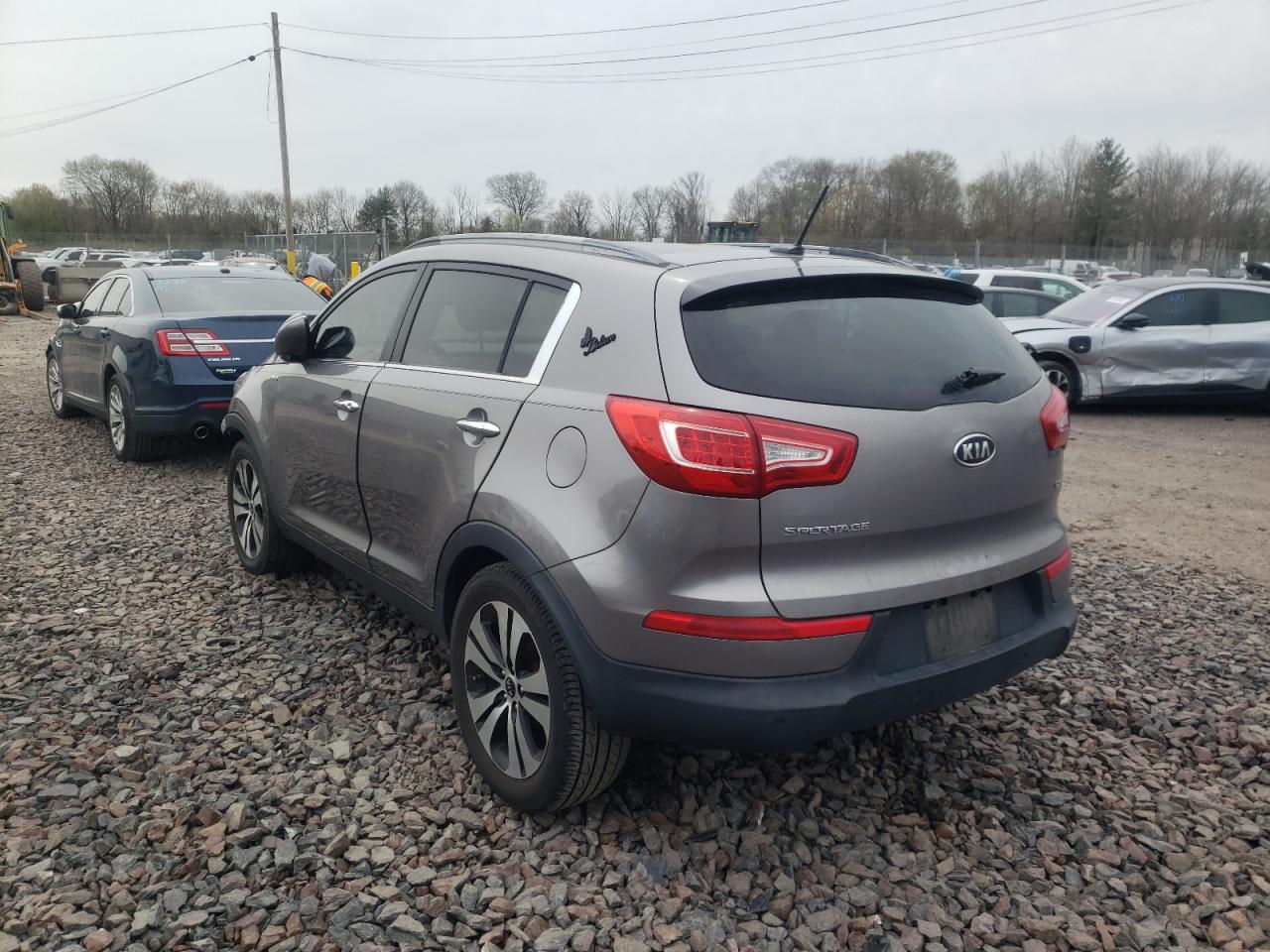 Photo 3 from auction – 2011 KIA SPORTAGE E with VIN KNDPCCA26B7083533