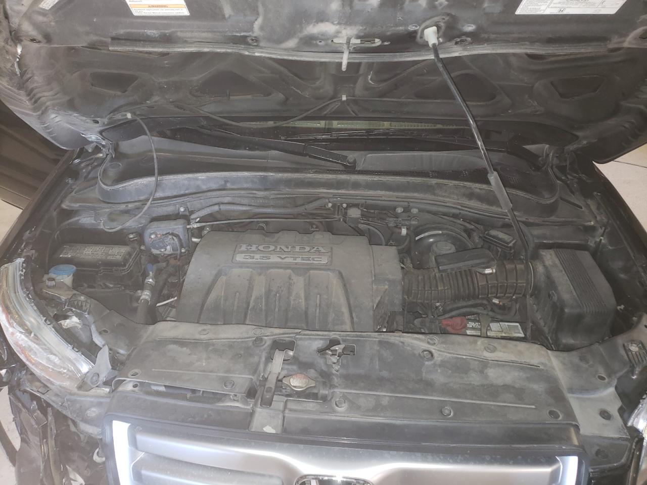 Photo 7 from auction – 2006 HONDA PILOT EX with VIN 2HKYF18696H540720