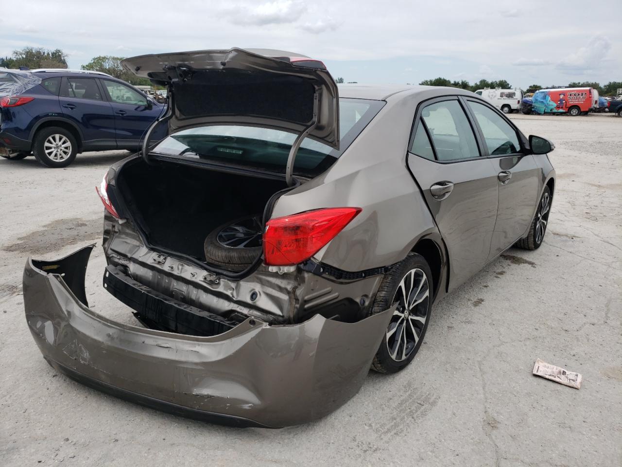Photo 4 from auction – 2017 TOYOTA COROLLA L with VIN 5YFBURHEXHP601628