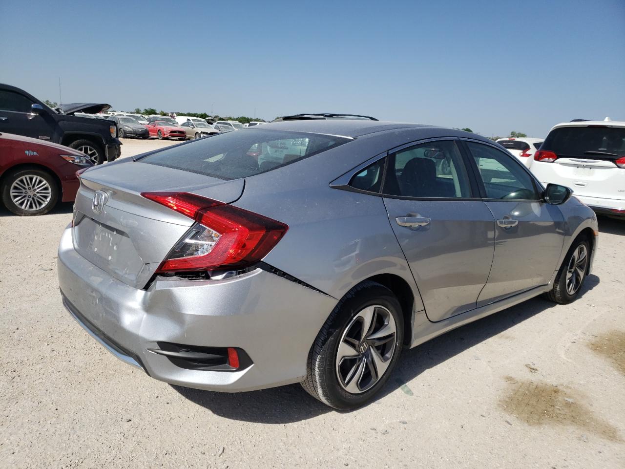 Photo 4 from auction – 2019 HONDA CIVIC LX with VIN 19XFC2F67KE050459