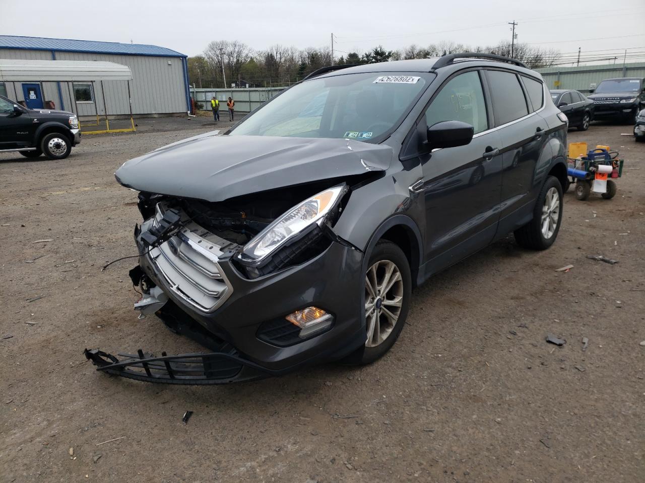 Photo 2 from auction – 2018 FORD ESCAPE SE with VIN 1FMCU9GD6JUD13316