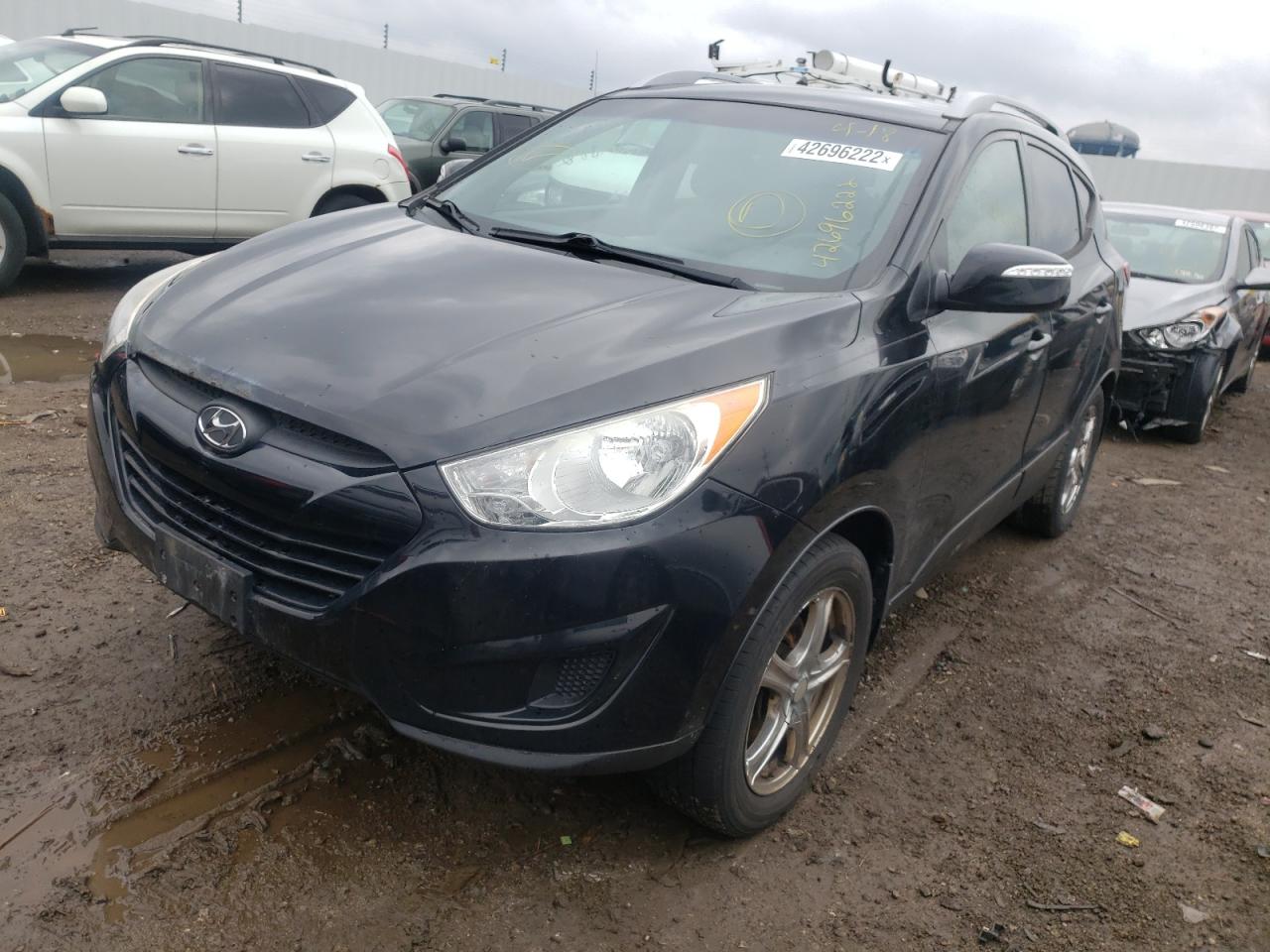 Photo 2 from auction – 2012 HYUNDAI TUCSON GLS with VIN KM8JUCAC2CU397562