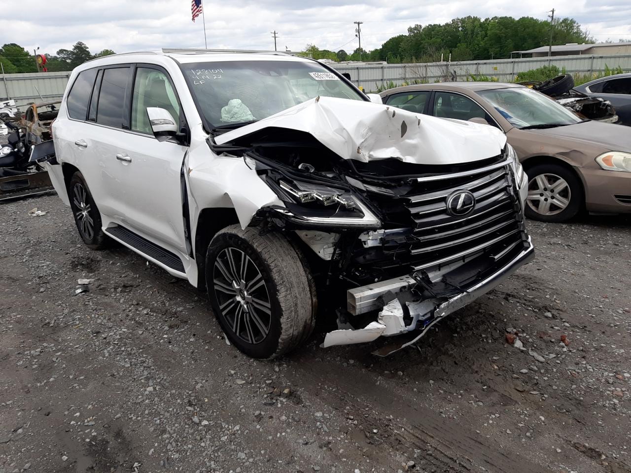 LEXUS LX 570 2018 with VIN JTJHY7AX1J4260057 - Photo from auction