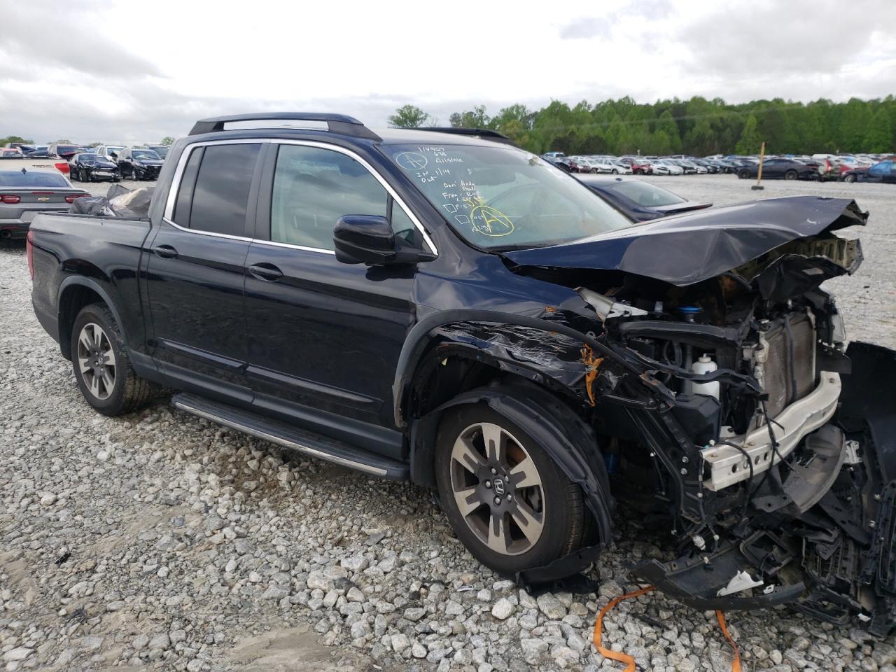 HONDA RIDGELINE 2017 with VIN 5FPYK2F62HB008190 - Photo from auction