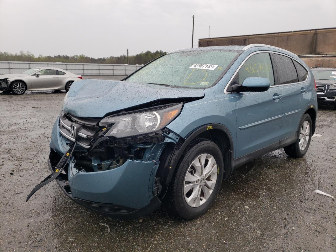 Photo 2 from auction – 2014 HONDA CR-V EXL with VIN 2HKRM4H73EH717541