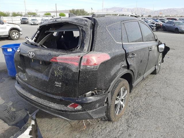 Photo 4 from auction – 2018 TOYOTA RAV4 ADVEN with VIN 2T3RFREV1JW811950