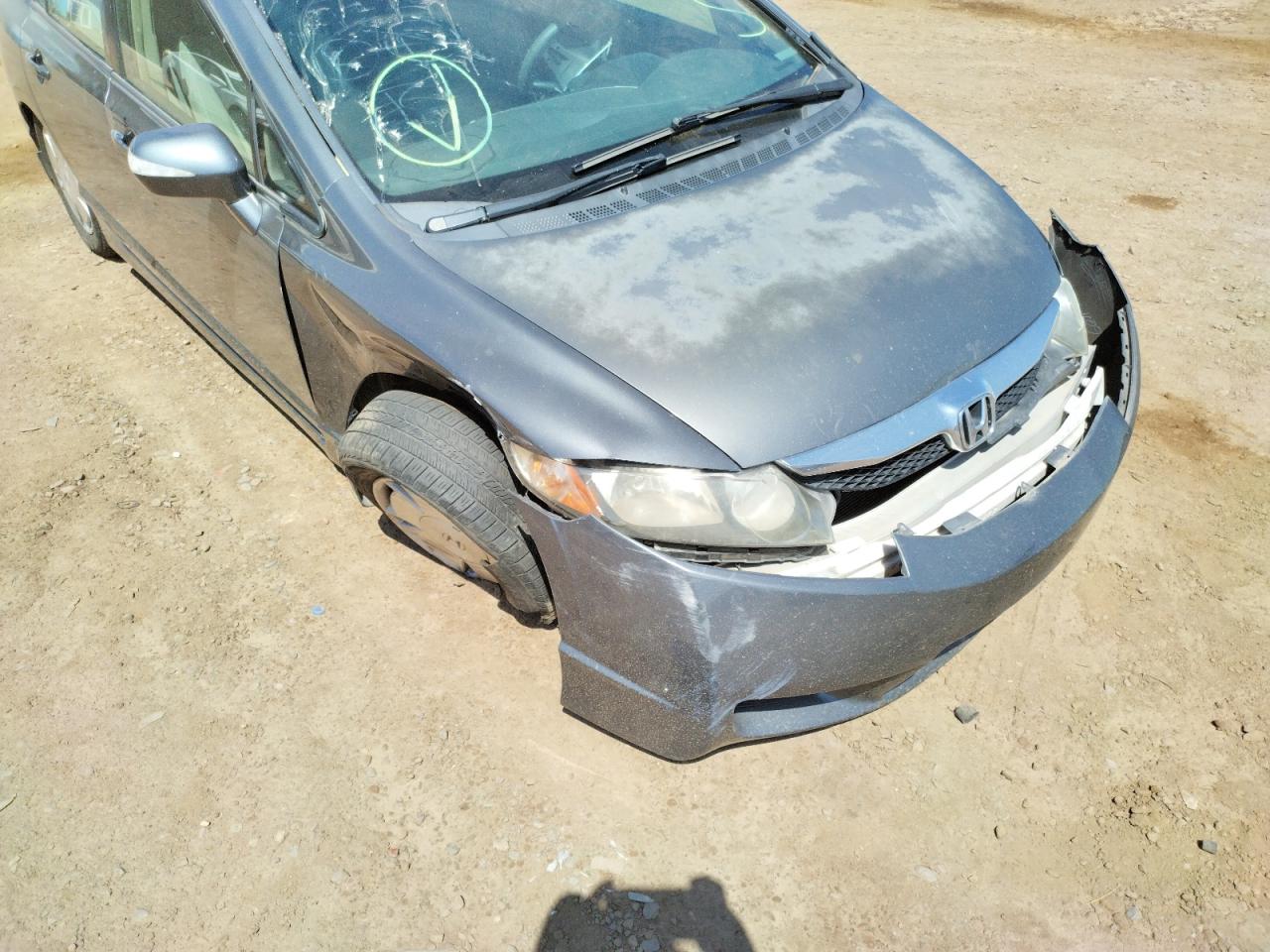 Photo 9 from auction – 2009 HONDA CIVIC HYBR with VIN JHMFA36219S006472