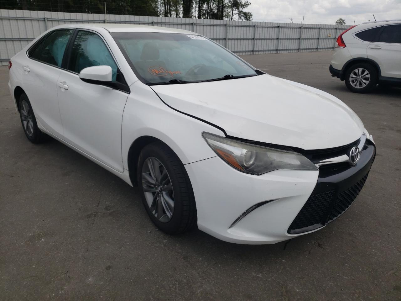 TOYOTA CAMRY LE 2016 with VIN 4T1BF1FK7GU603077 - Photo from auction