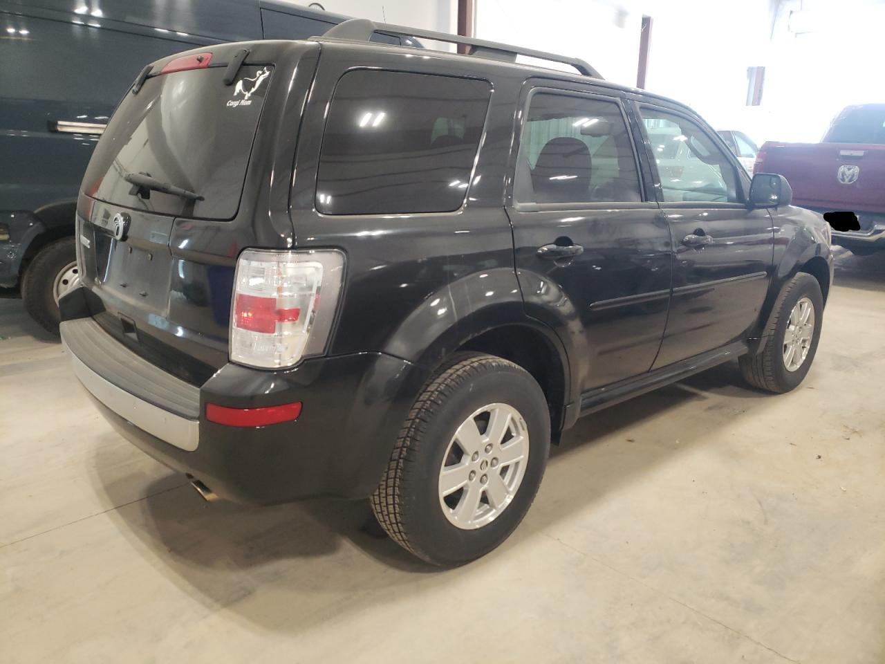 Photo 4 from auction – 2011 MERCURY MARINER with VIN 4M2CN8B78BKJ00713