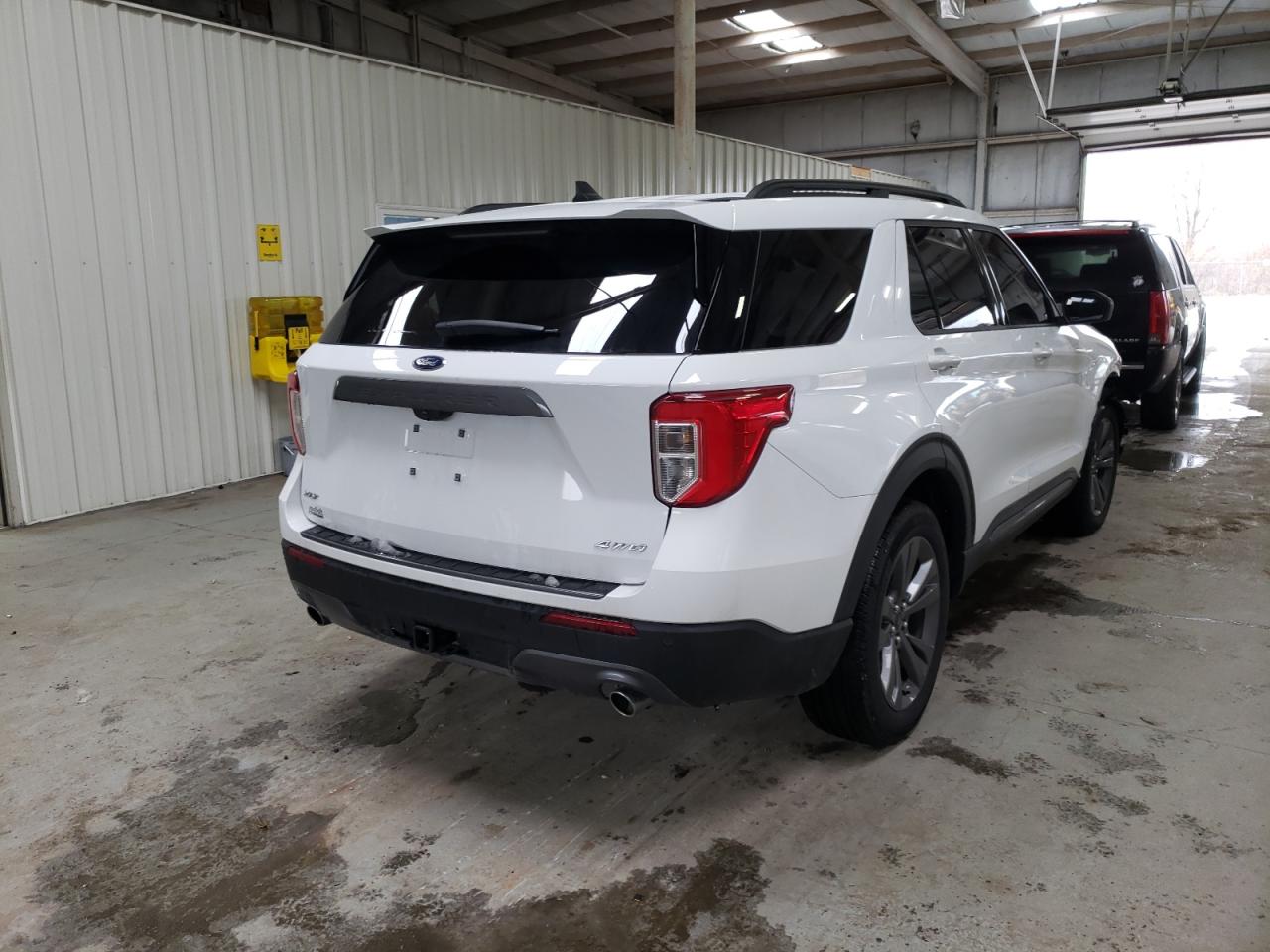Photo 4 from auction – 2021 FORD EXPLORER X with VIN 1FMSK8DH2MGA29171