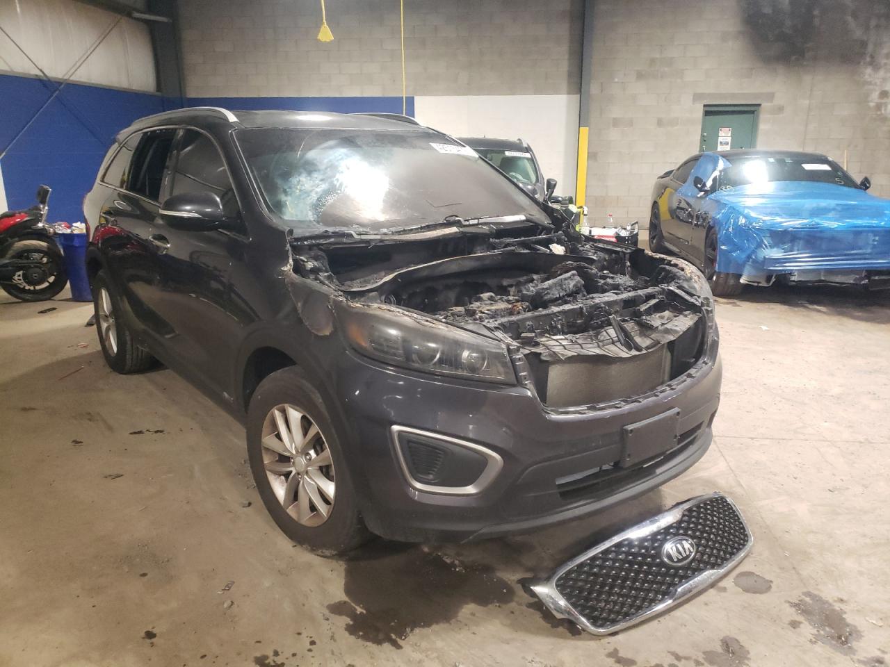 KIA SORENTO LX 2016 with VIN 5XYPGDA3XGG151295 - Photo from auction