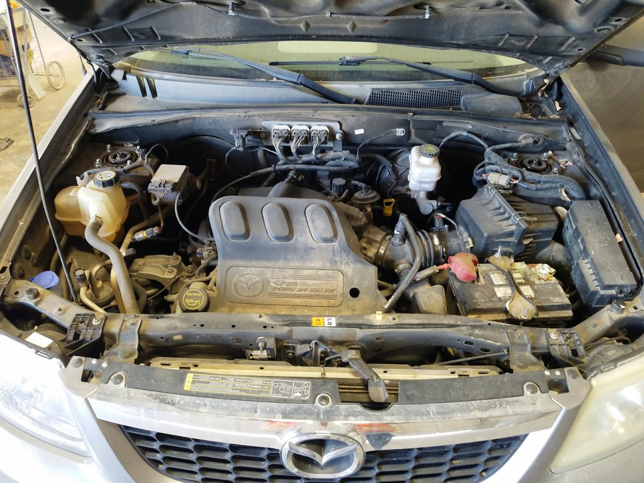 Photo 7 from auction – 2008 MAZDA TRIBUTE S with VIN 4F2CZ06128KM15811