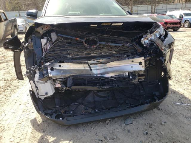 Photo 9 from auction – 2021 TOYOTA RAV4 LE with VIN JTMMWRFVXMD126422