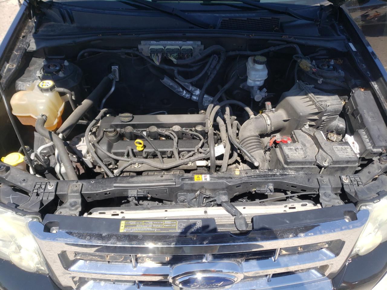 Photo 7 from auction – 2009 FORD ESCAPE LIM with VIN 1FMCU04739KB34197