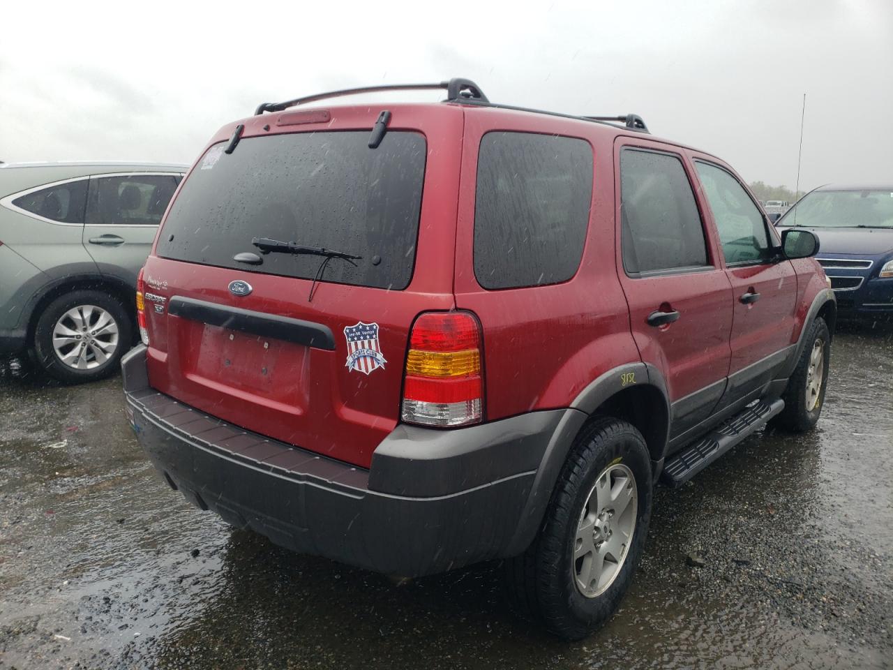 Photo 4 from auction – 2004 FORD ESCAPE XLT with VIN 1FMYU03165KA22541