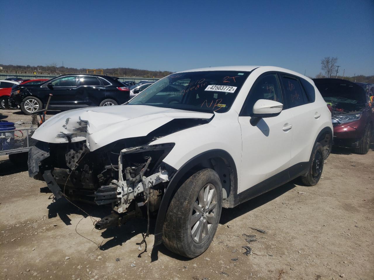 Photo 2 from auction – 2015 MAZDA CX-5 TOURI with VIN JM3KE2CY0F0521341