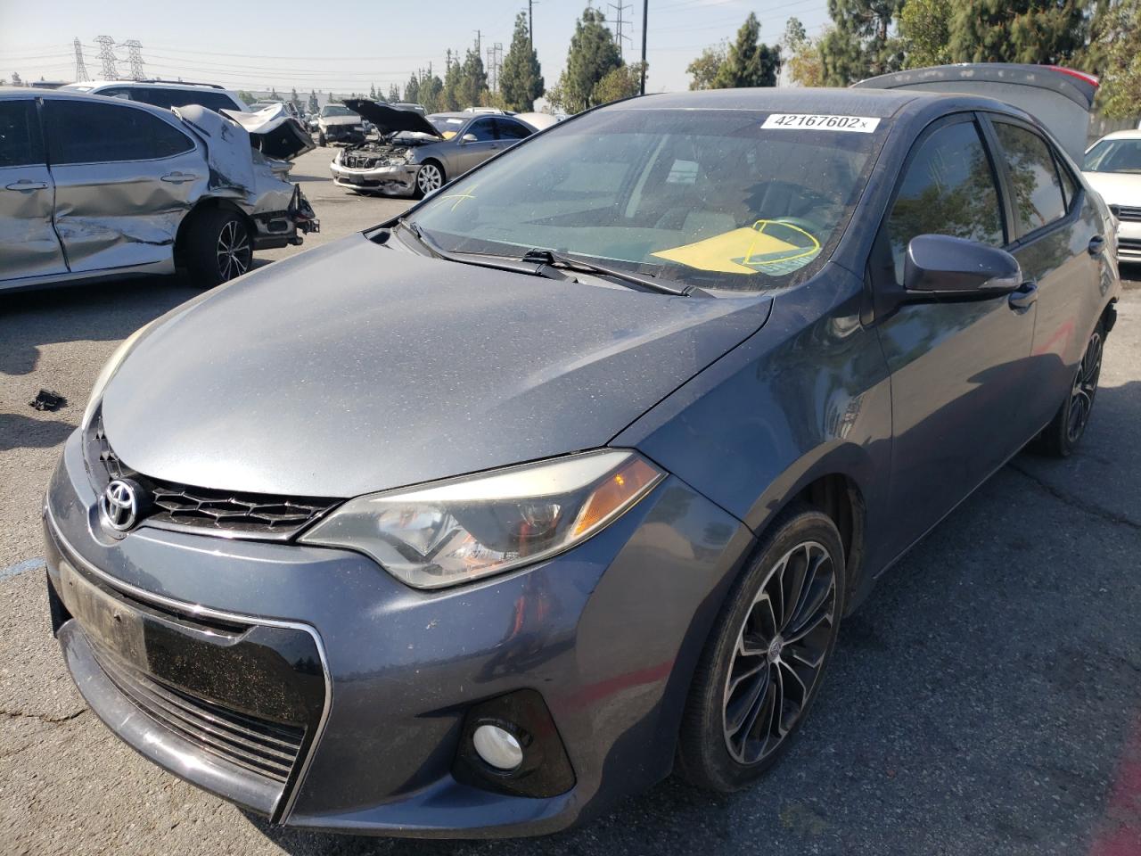Photo 2 from auction – 2014 TOYOTA COROLLA with VIN 5YFBURHE2EP083185