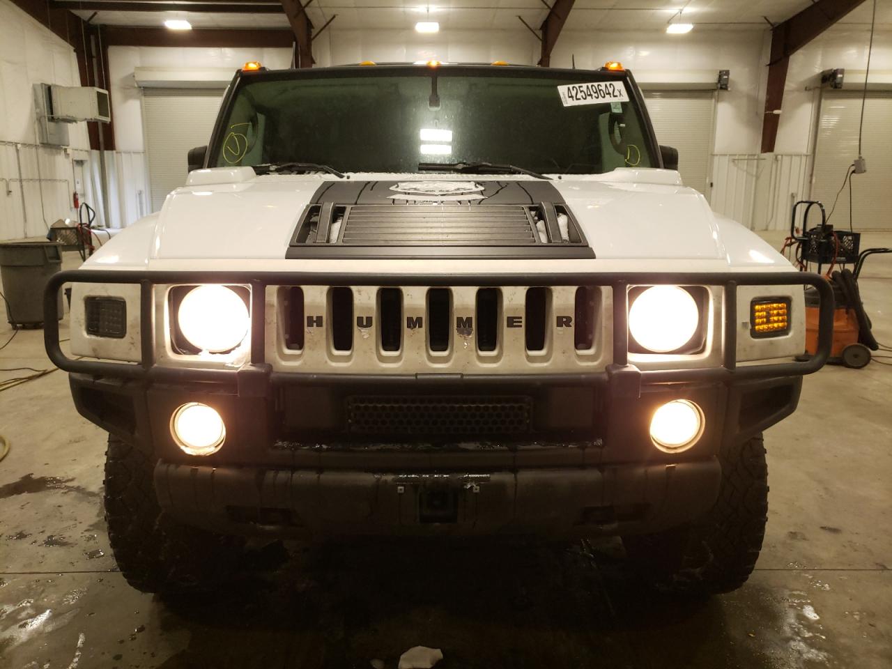 Photo 9 from auction – 2003 HUMMER H2 with VIN 5GRGN23U13H147734