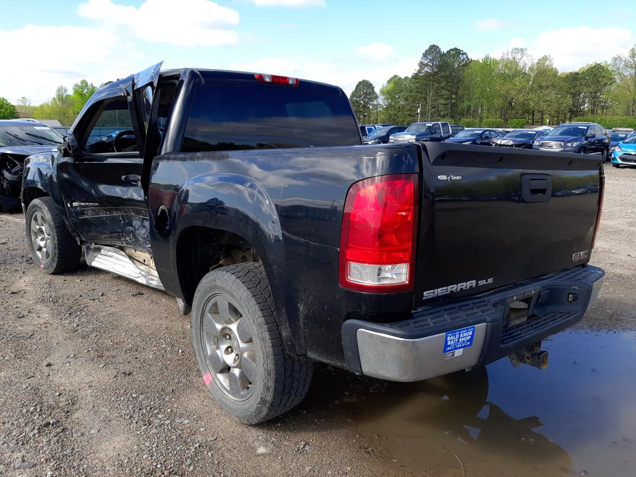 Photo 3 from auction – 2009 GMC SIERRA C15 with VIN 3GTEC23J69G232933