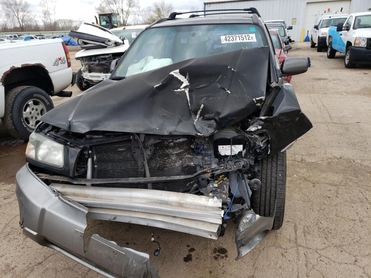 Photo 9 from auction – 2004 SUBARU FORESTER 2 with VIN JF1SG65674H754045