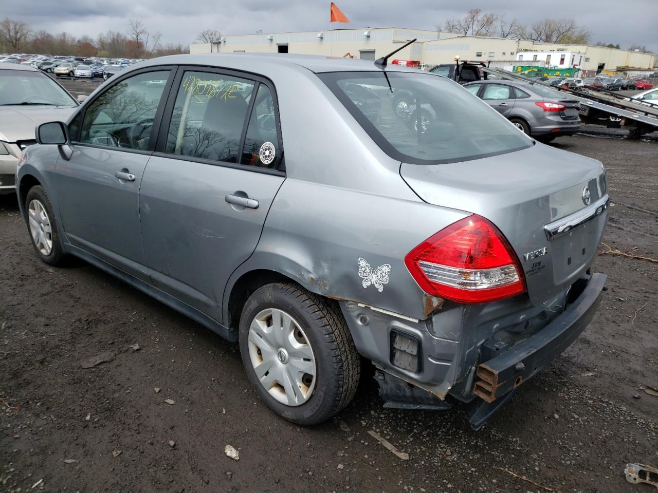 Photo 3 from auction – 2011 NISSAN VERSA S with VIN 3N1BC1AP3BL390909