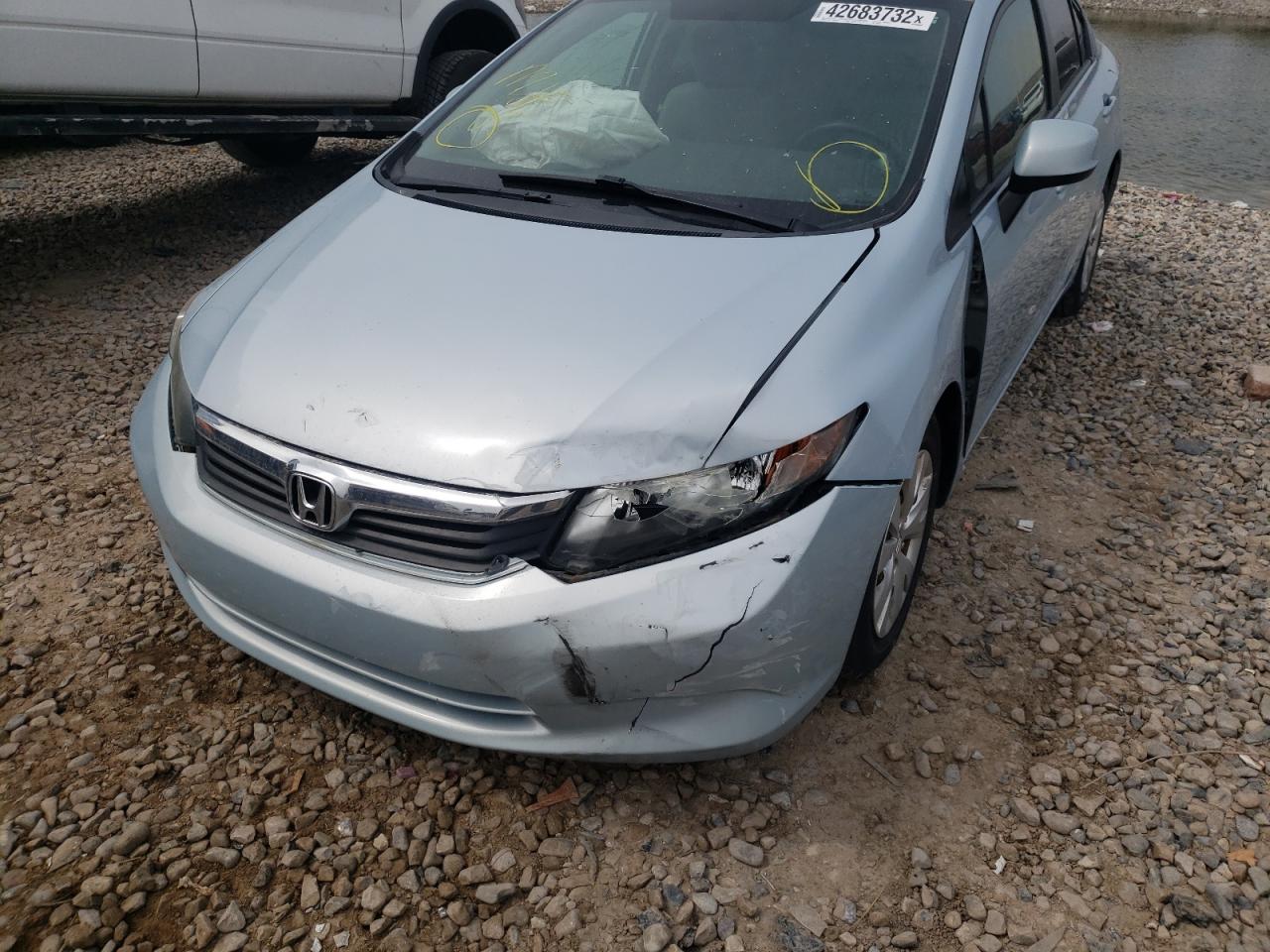 Photo 9 from auction – 2012 HONDA CIVIC LX with VIN 19XFB2F58CE336719