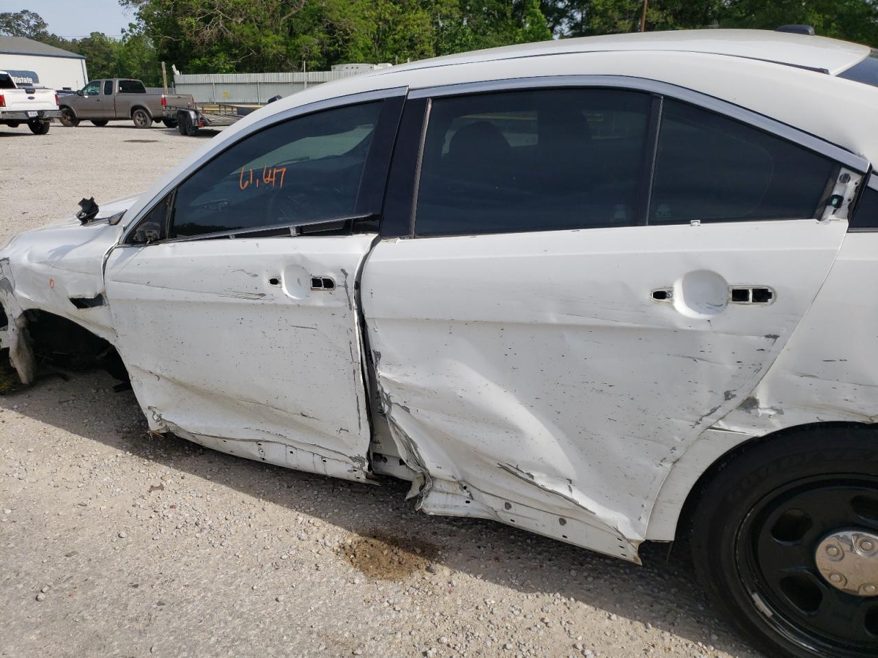 Photo 9 from auction – 2016 FORD TAURUS POL with VIN 1FAHP2L84GG136604
