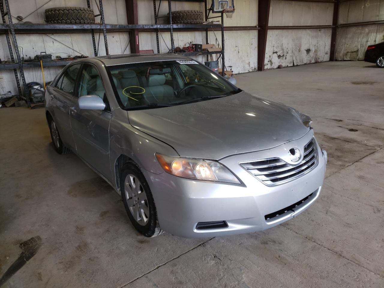 TOYOTA CAMRY HYBR 2007 with VIN JTNBB46K073025861 - Photo from auction