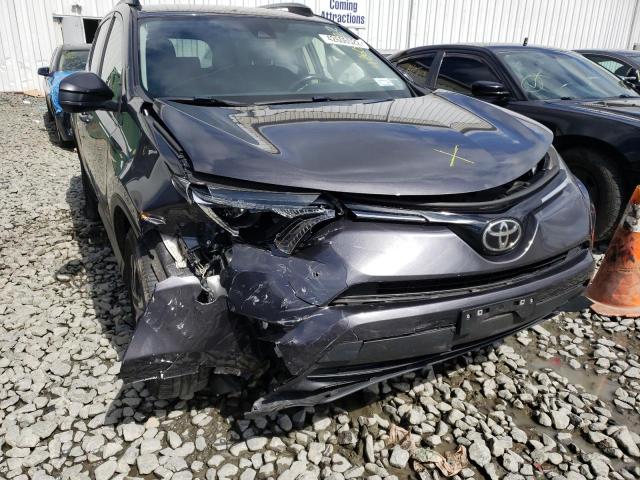 Photo 9 from auction – 2017 TOYOTA RAV4 LE with VIN JTMBFREV3HJ126911