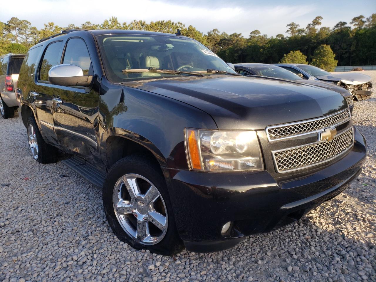 CHEVROLET TAHOE 2011 with VIN 1GNSKCE09BR137926 - Photo from auction