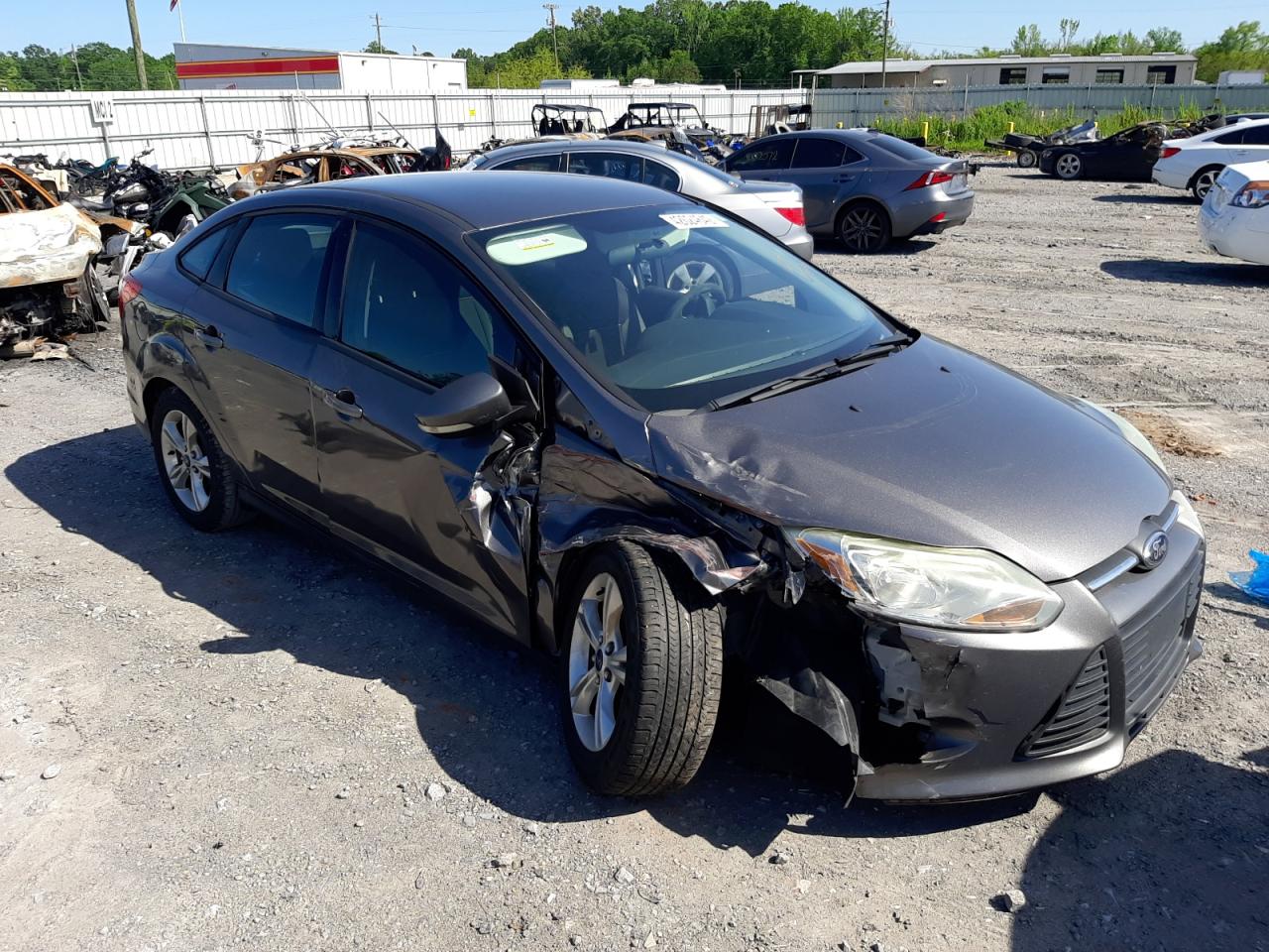 FORD FOCUS SE 2014 with VIN 1FADP3F28EL166012 - Photo from auction