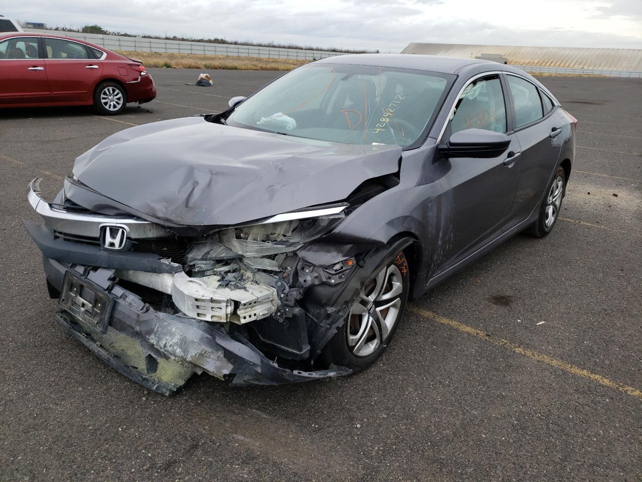 Photo 2 from auction – 2016 HONDA CIVIC LX with VIN 2HGFC2F58GH528330