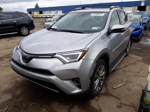 Photo 2 from auction – 2018 TOYOTA RAV4 LIMIT with VIN JTMDFREV1JD254724