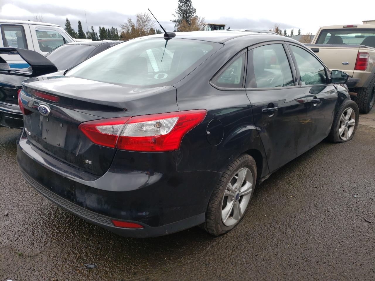 Photo 4 from auction – 2014 FORD FOCUS SE with VIN 1FADP3F22EL443107